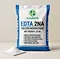 Fertilizer Grade EDTA 2Na 25kg bag of X-HUMATE chelated micronutrient with export packaging and a pile of pure white powder